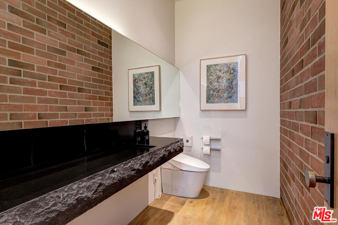 Located in the guard-gated Stoneridge Estates