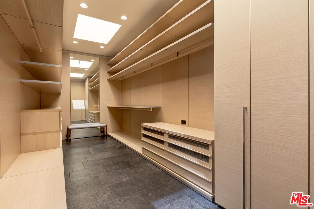 Located in the guard-gated Stoneridge Estates