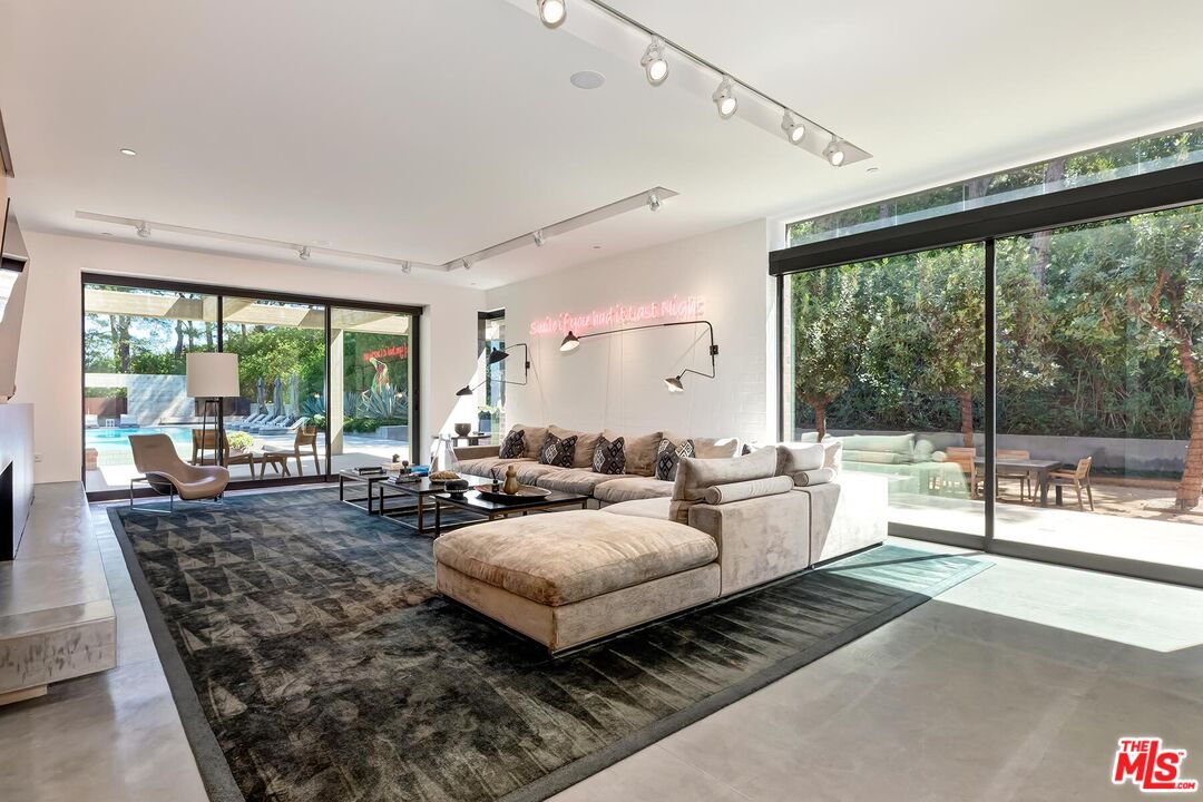 Located in the guard-gated Stoneridge Estates