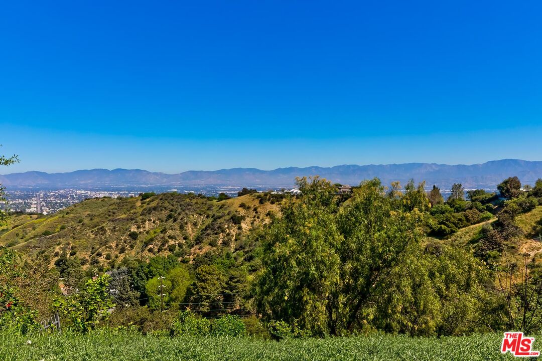 Located in the guard-gated Stoneridge Estates