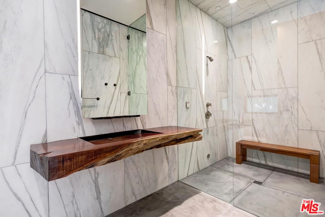 Located in the guard-gated Stoneridge Estates