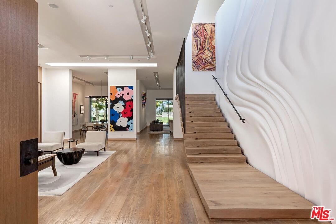 Located in the guard-gated Stoneridge Estates