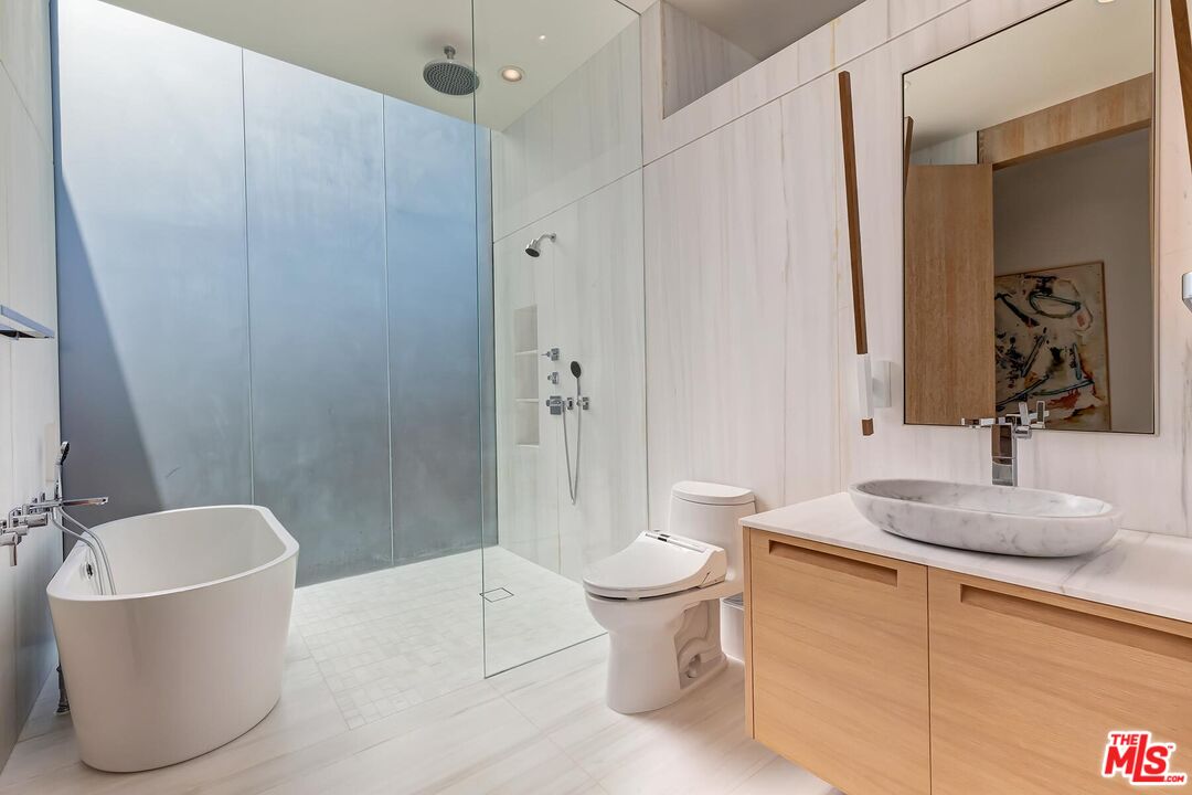 Located in the guard-gated Stoneridge Estates