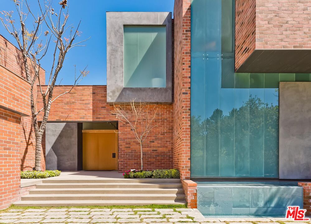 Located in the guard-gated Stoneridge Estates