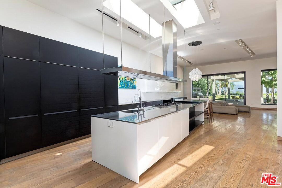 Located in the guard-gated Stoneridge Estates