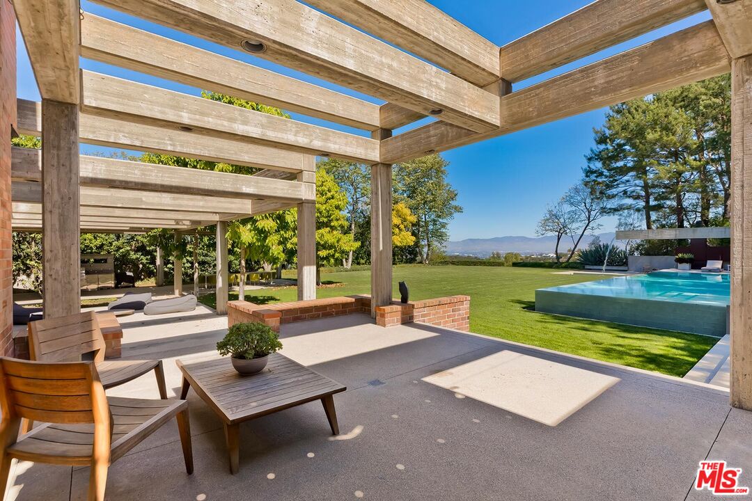 Located in the guard-gated Stoneridge Estates