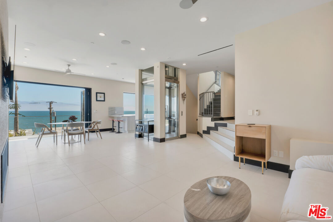 Expansive Ocean and City Light Views