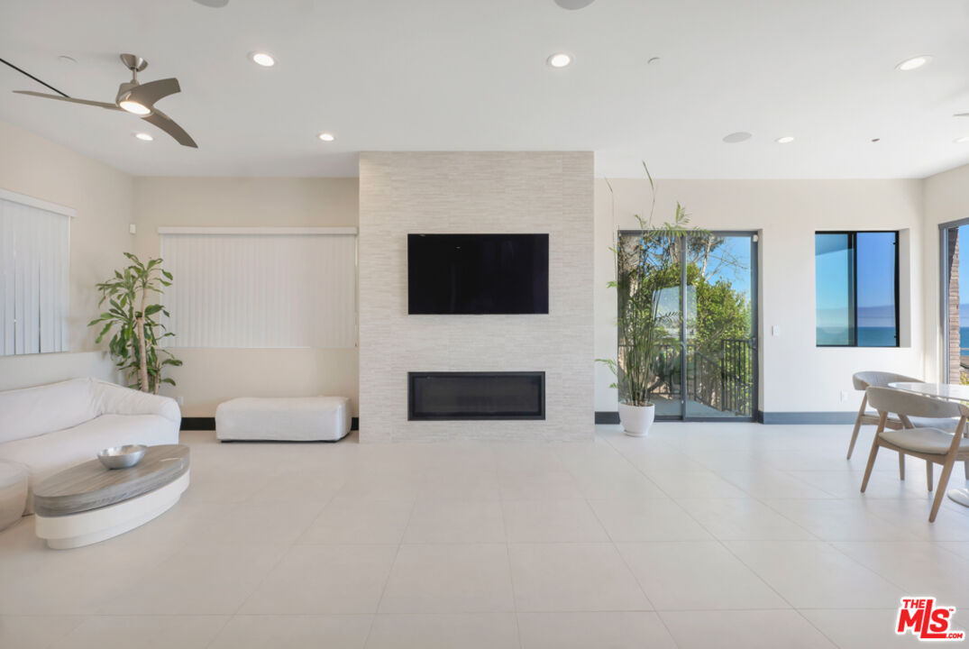 Expansive Ocean and City Light Views