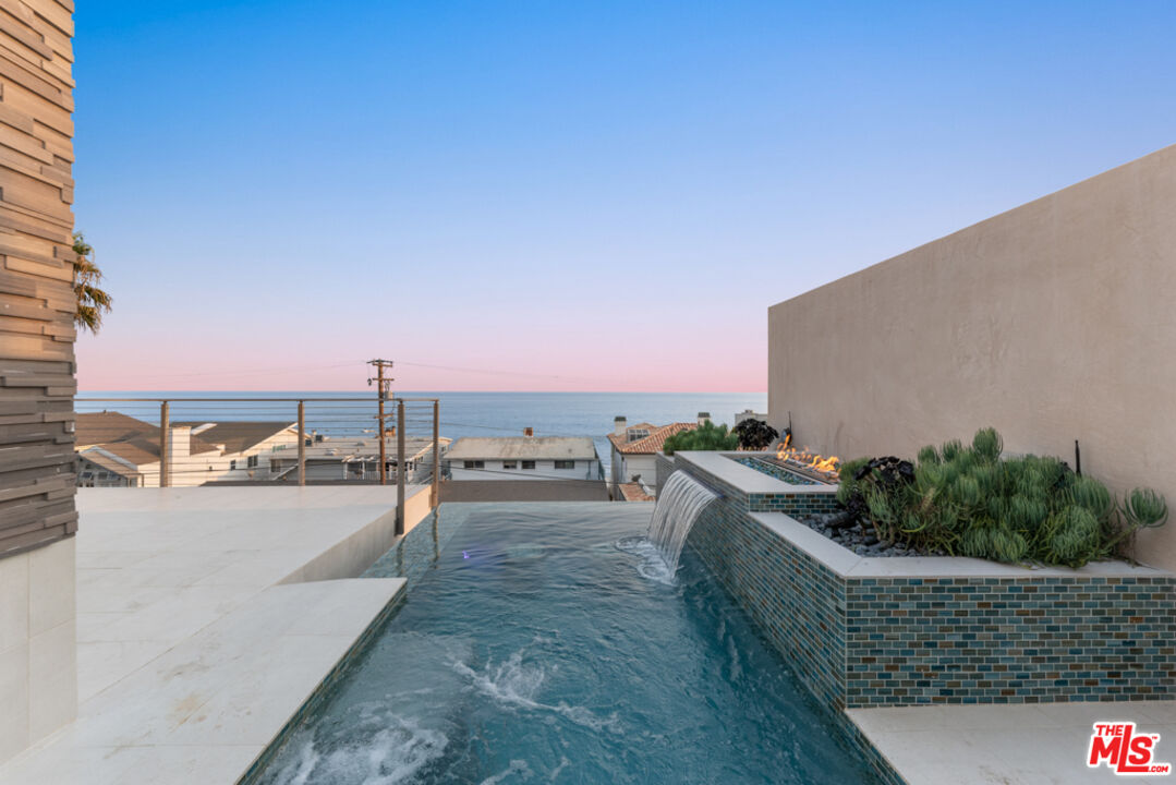 Expansive Ocean and City Light Views
