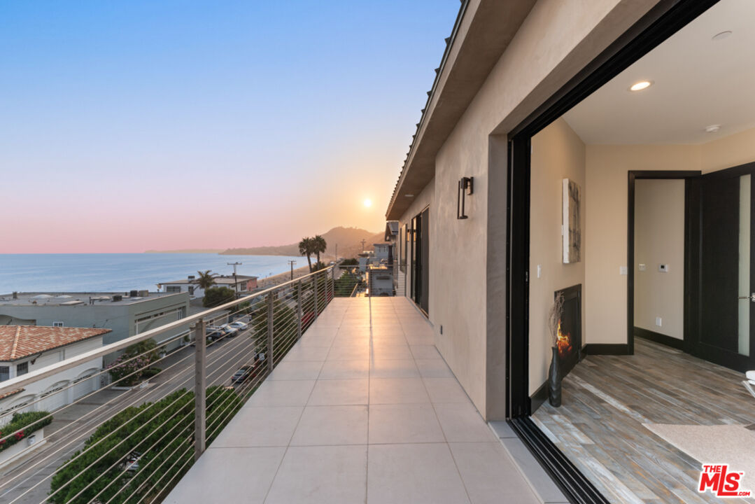 Expansive Ocean and City Light Views
