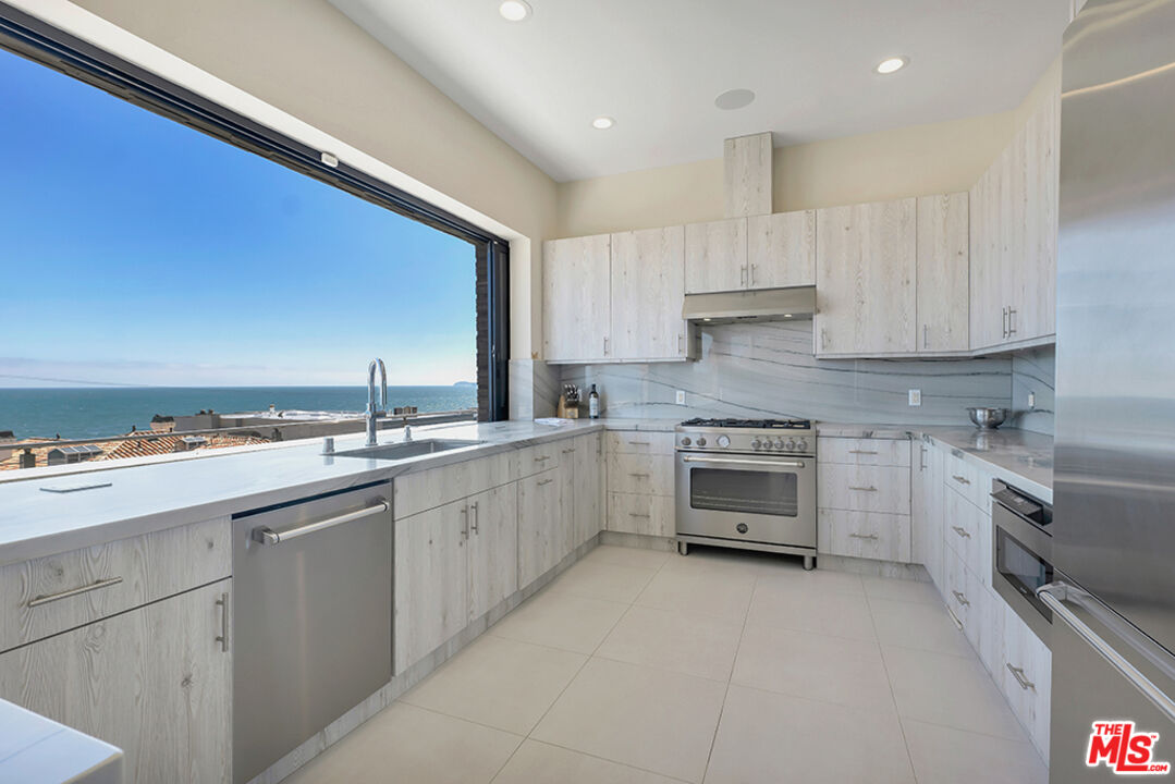 Expansive Ocean and City Light Views