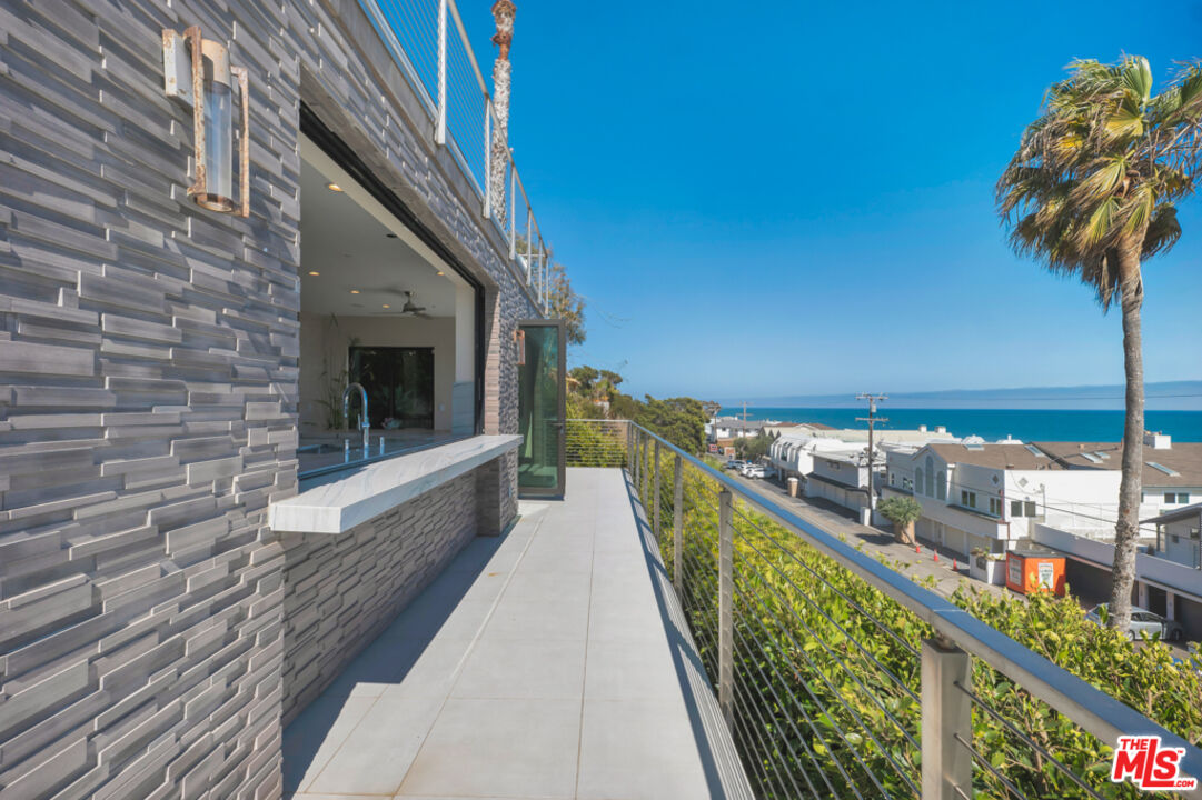 Expansive Ocean and City Light Views