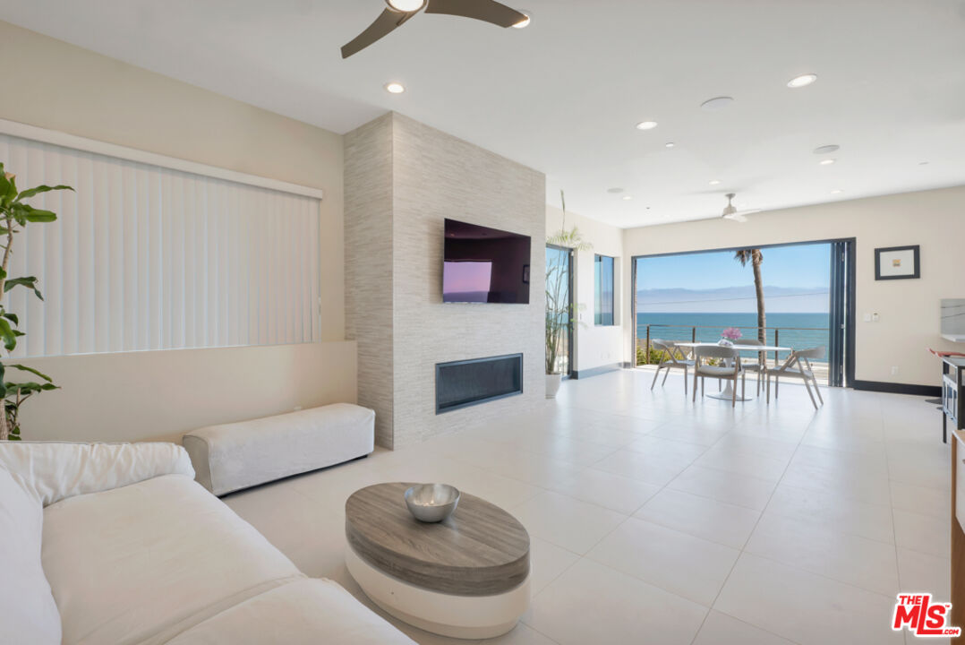 Expansive Ocean and City Light Views