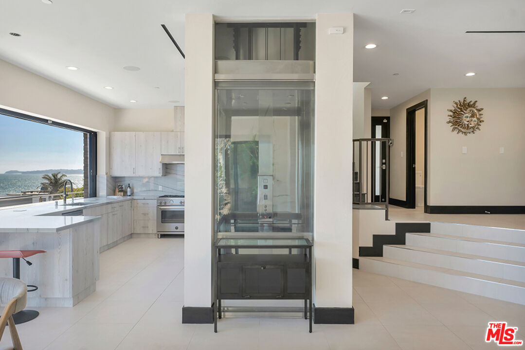 Expansive Ocean and City Light Views