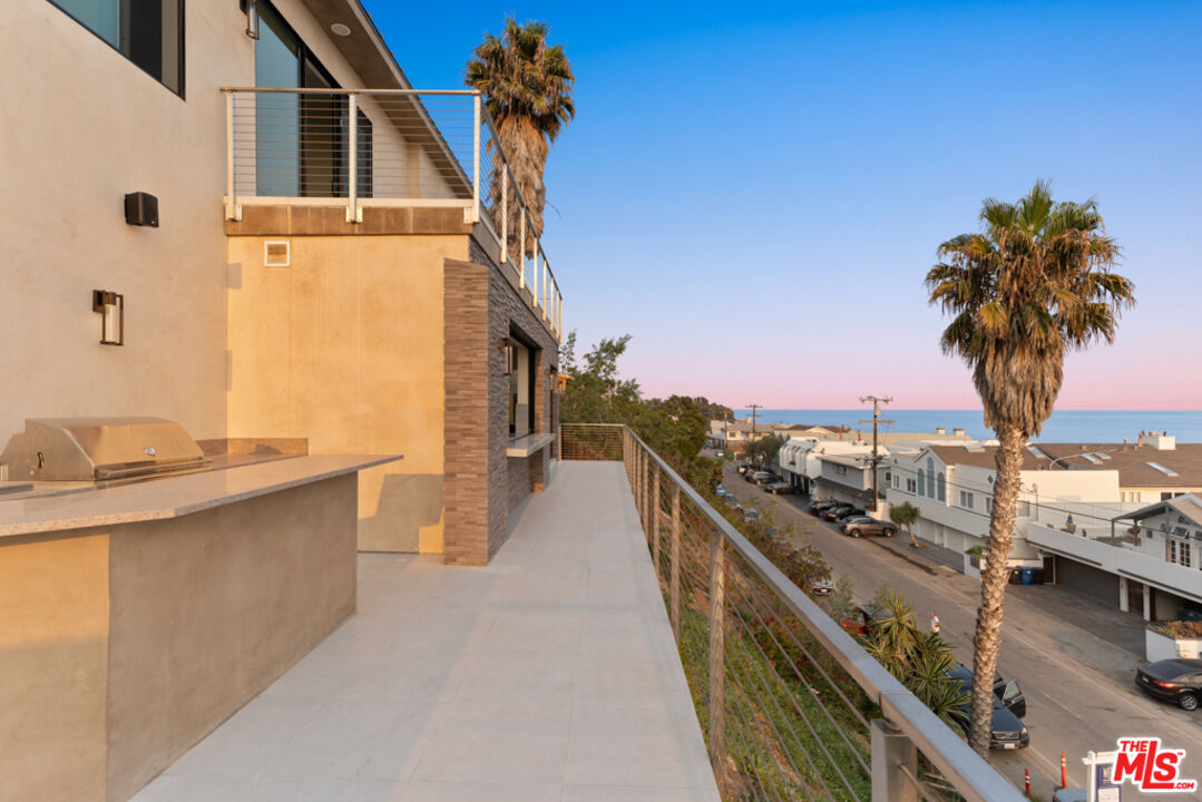 Expansive Ocean and City Light Views