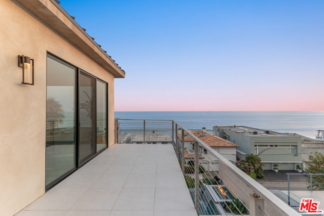 Expansive Ocean and City Light Views