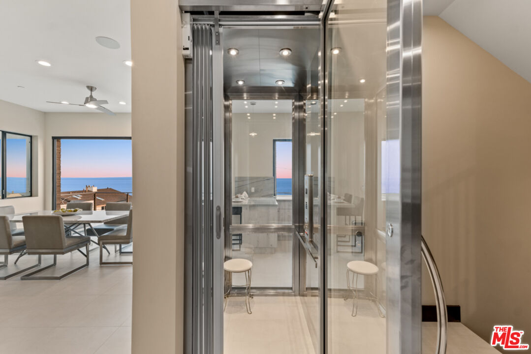 Expansive Ocean and City Light Views
