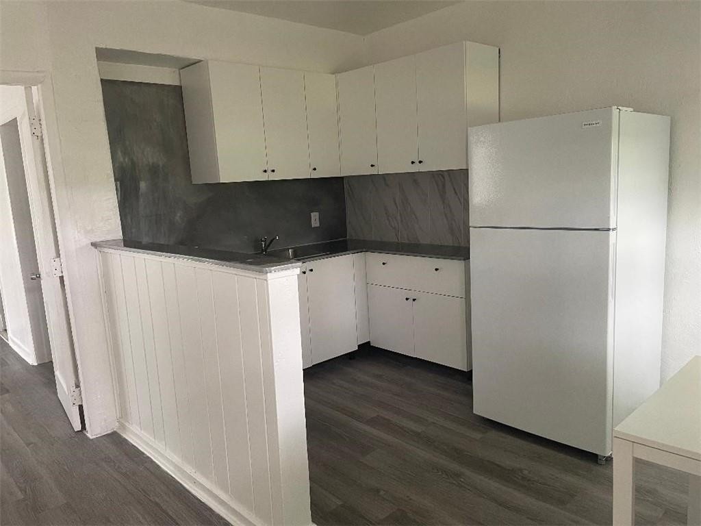 705-713 NE 3RD STREET