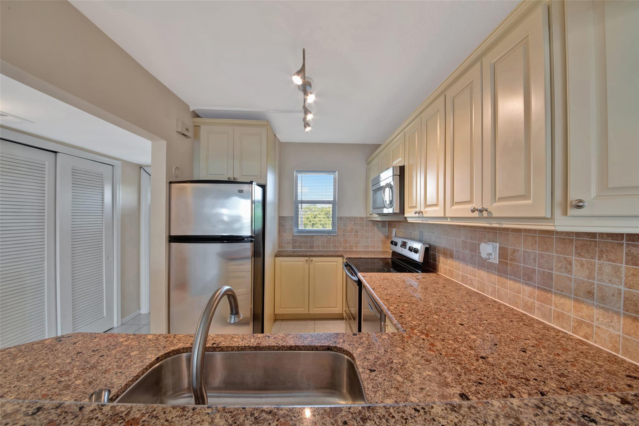 750 NE Spanish River 403