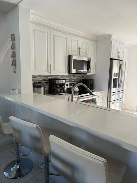 3965 Cocoplum Cir F