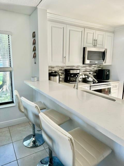 3965 Cocoplum Cir F