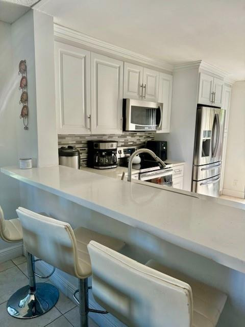 3965 Cocoplum Cir F