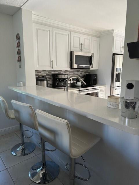 3965 Cocoplum Cir F