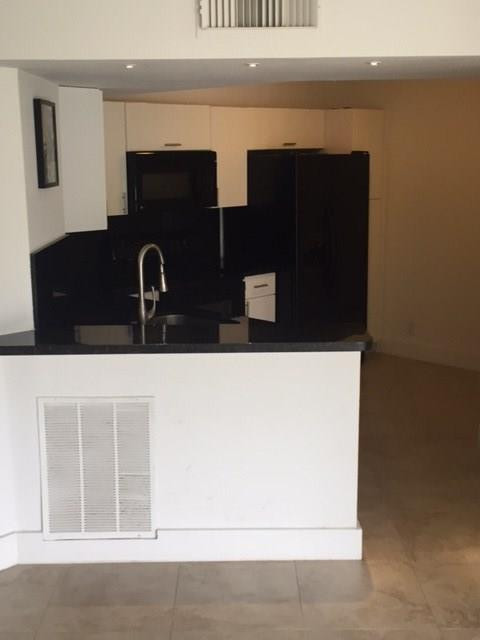 8761 Wiles Rd 103