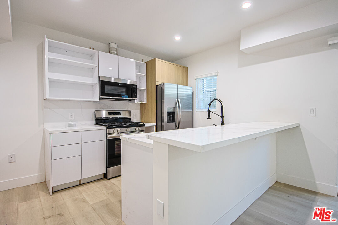 1321 N June St Unit: 3