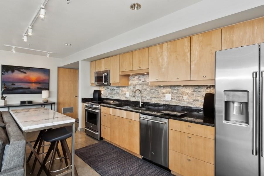 221 E College St Unit: 904