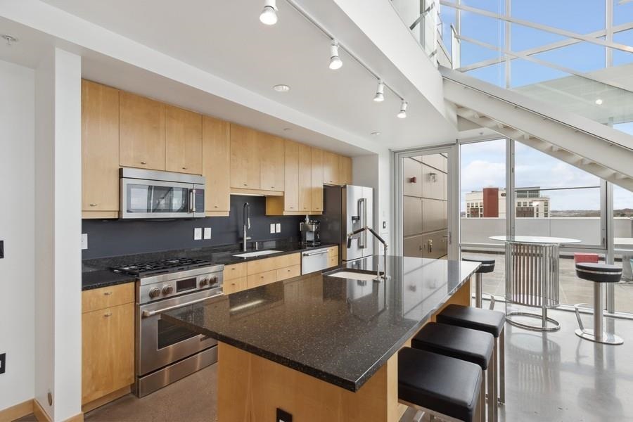 221 E College St Unit: 1206