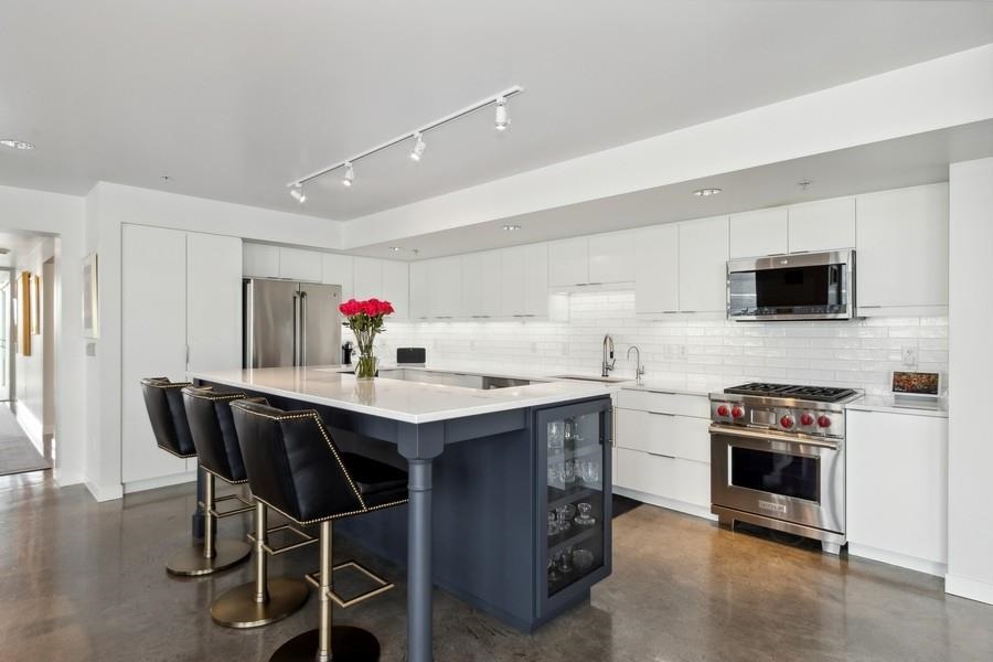 221 E College St #1201