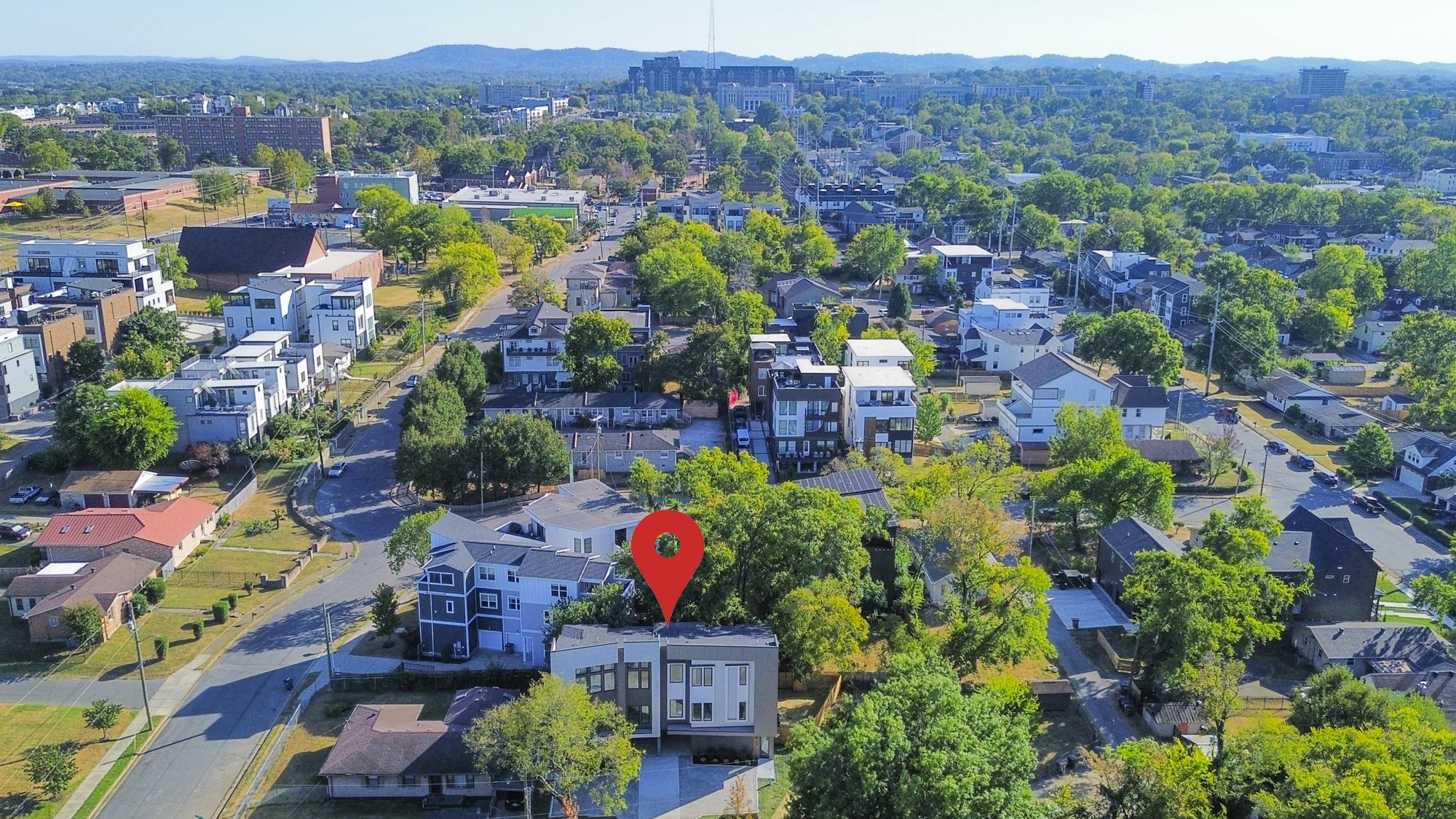 Aerial view of the Southside Cir property marked by a red pin among tree-lined Nashville streets.