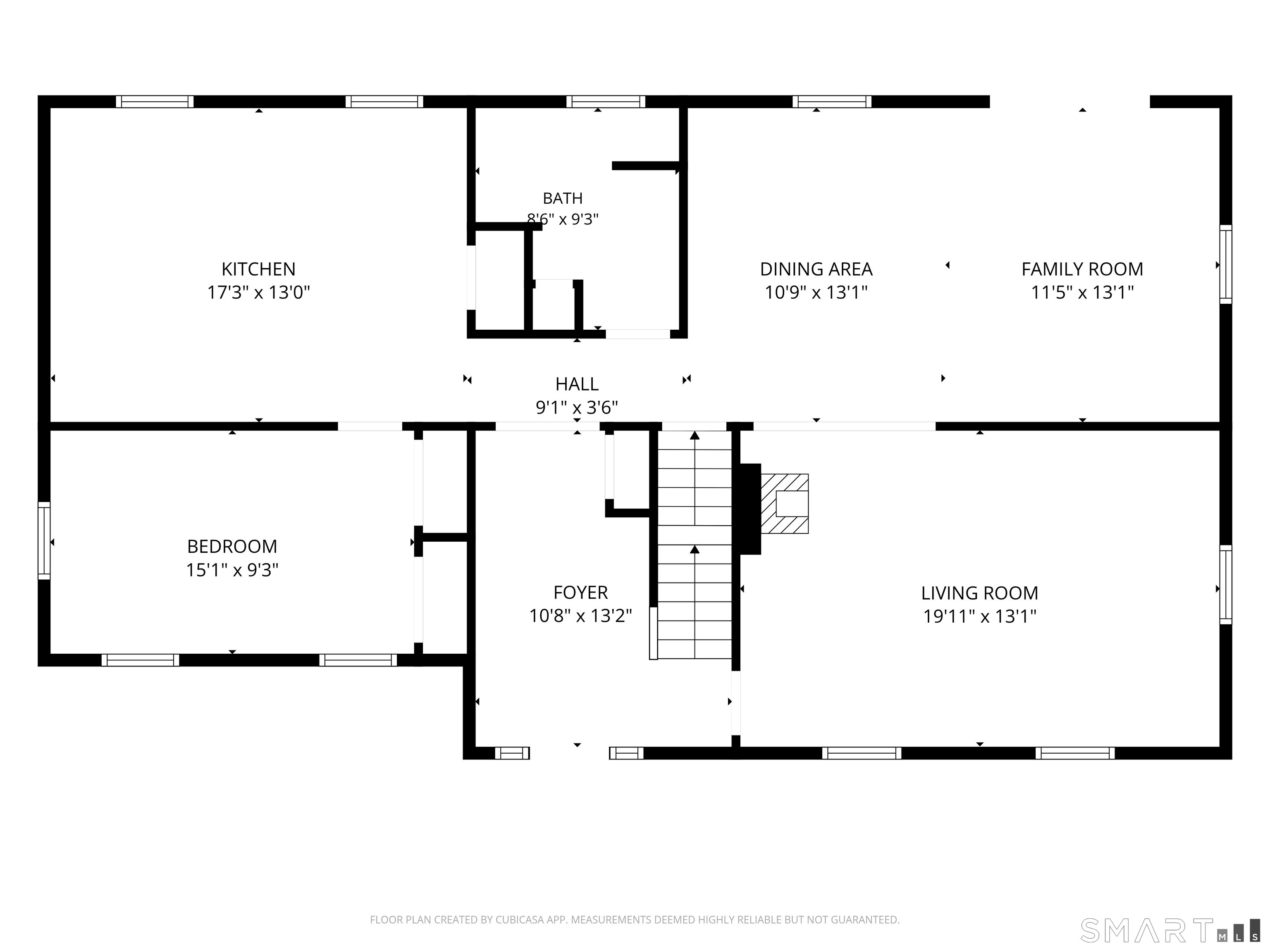 Floor plan showing a kitchen, bedroom, bath, dining area, family room, living room, foyer, hall, and stairs.