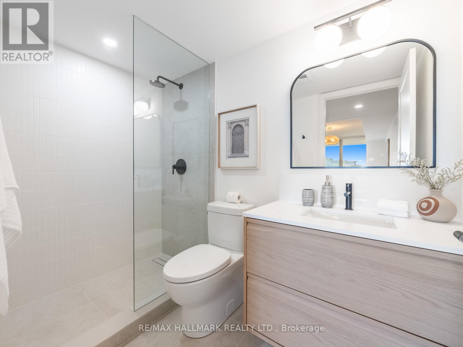 301 - 1797 QUEEN STREET E