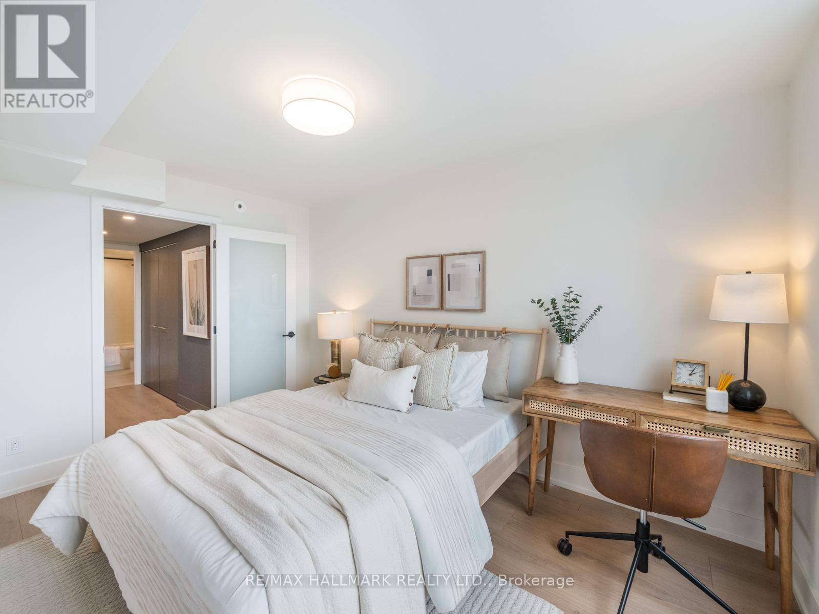 301 - 1797 QUEEN STREET E