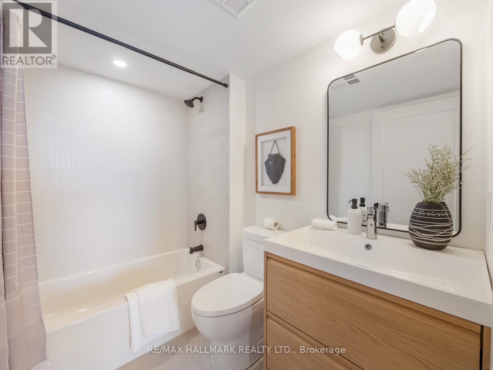 301 - 1797 QUEEN STREET E