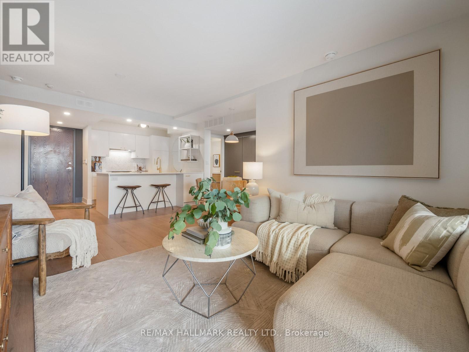 301 - 1797 QUEEN STREET E