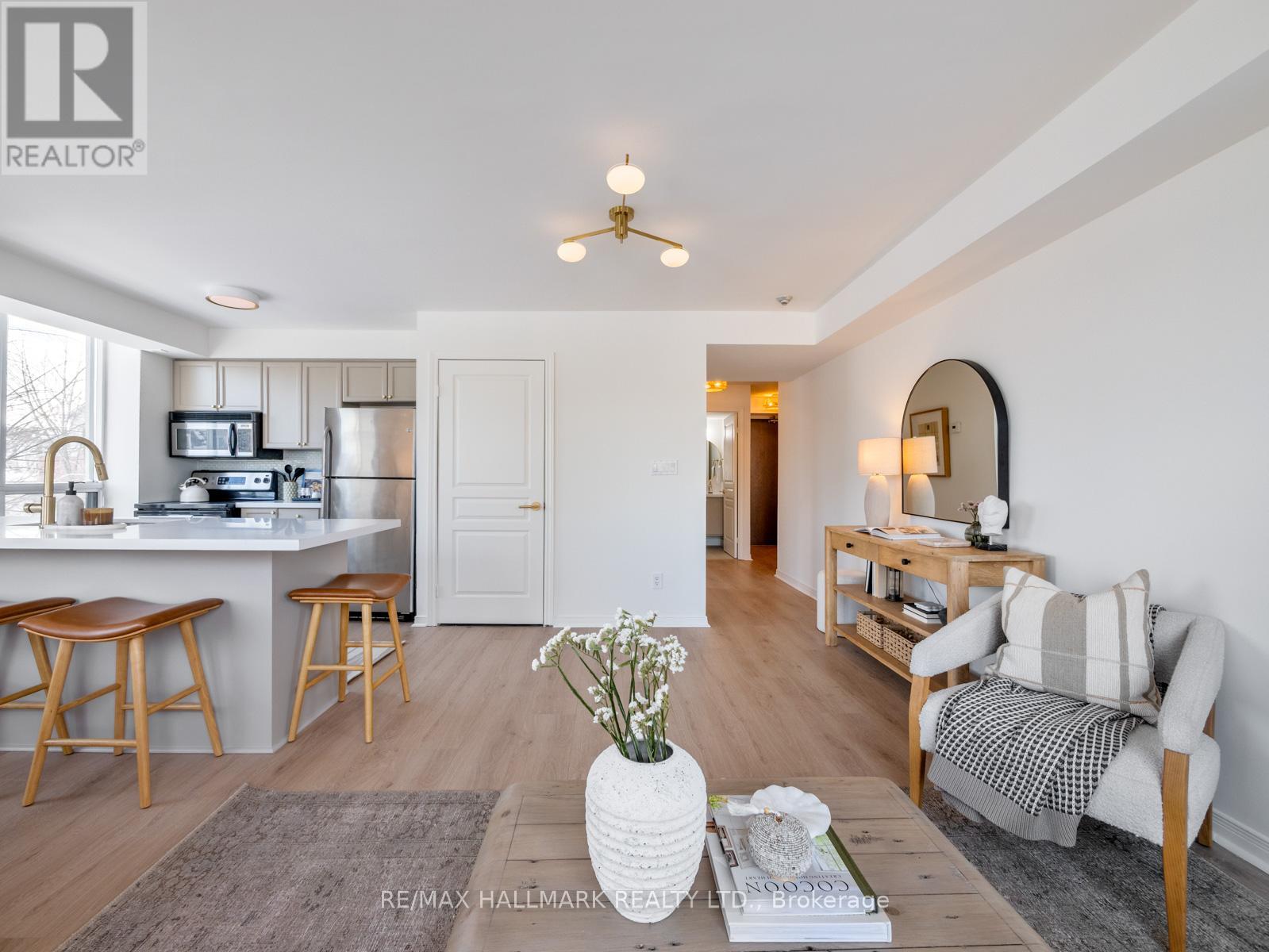 211 - 1765 QUEEN STREET E