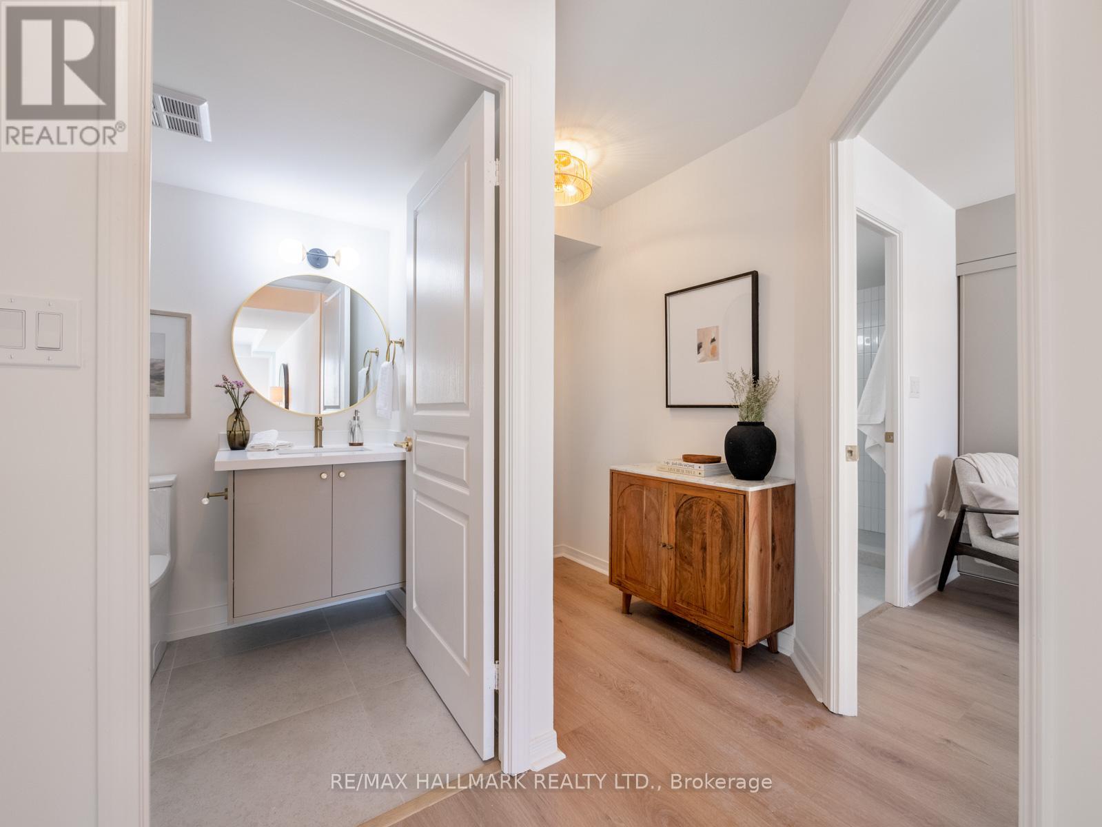 211 - 1765 QUEEN STREET E