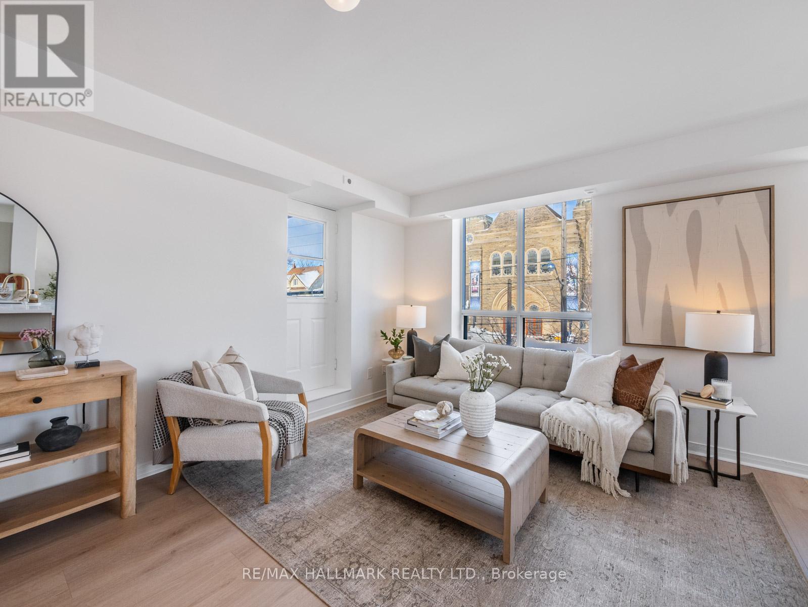 211 - 1765 QUEEN STREET E