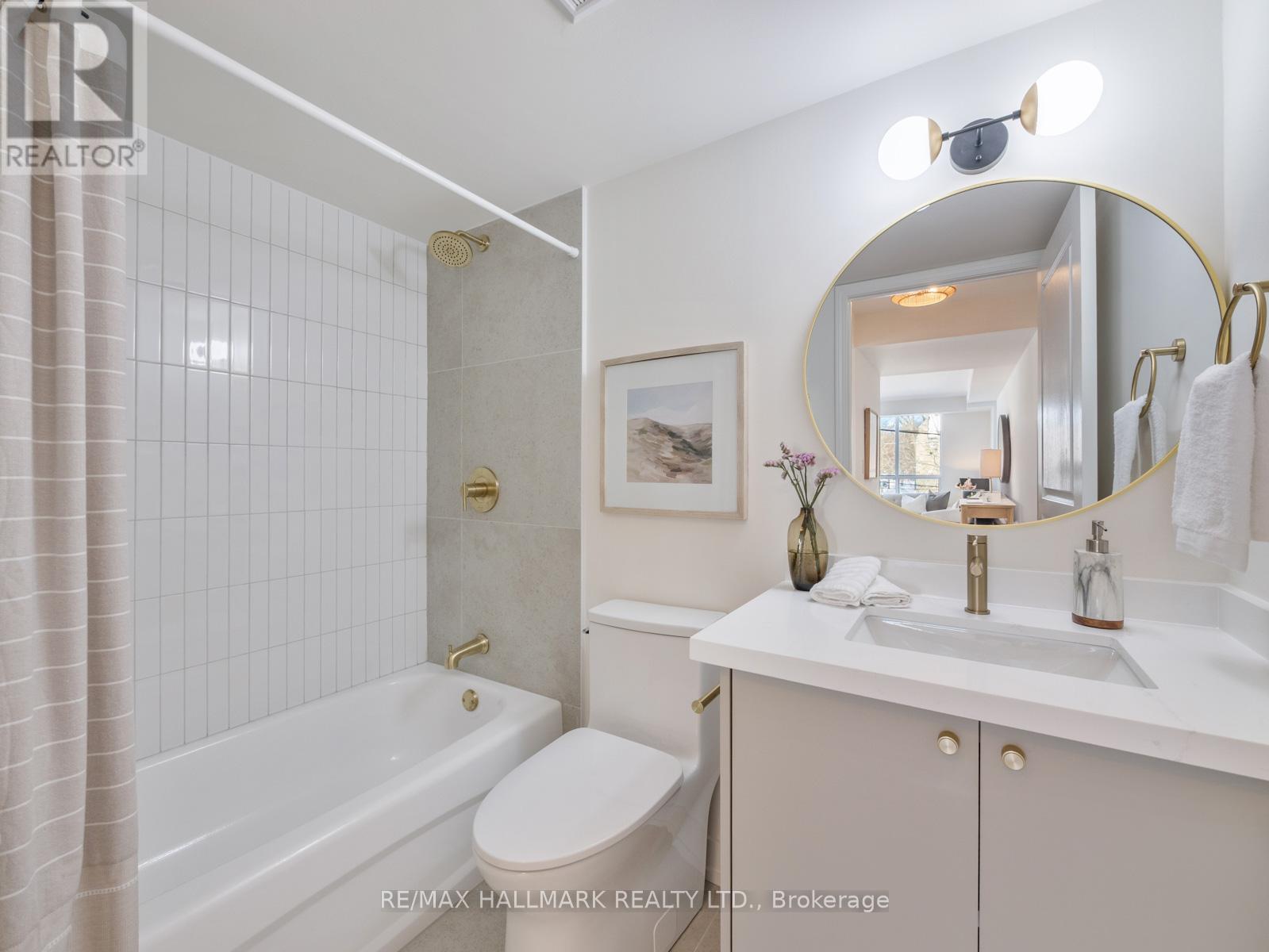 211 - 1765 QUEEN STREET E