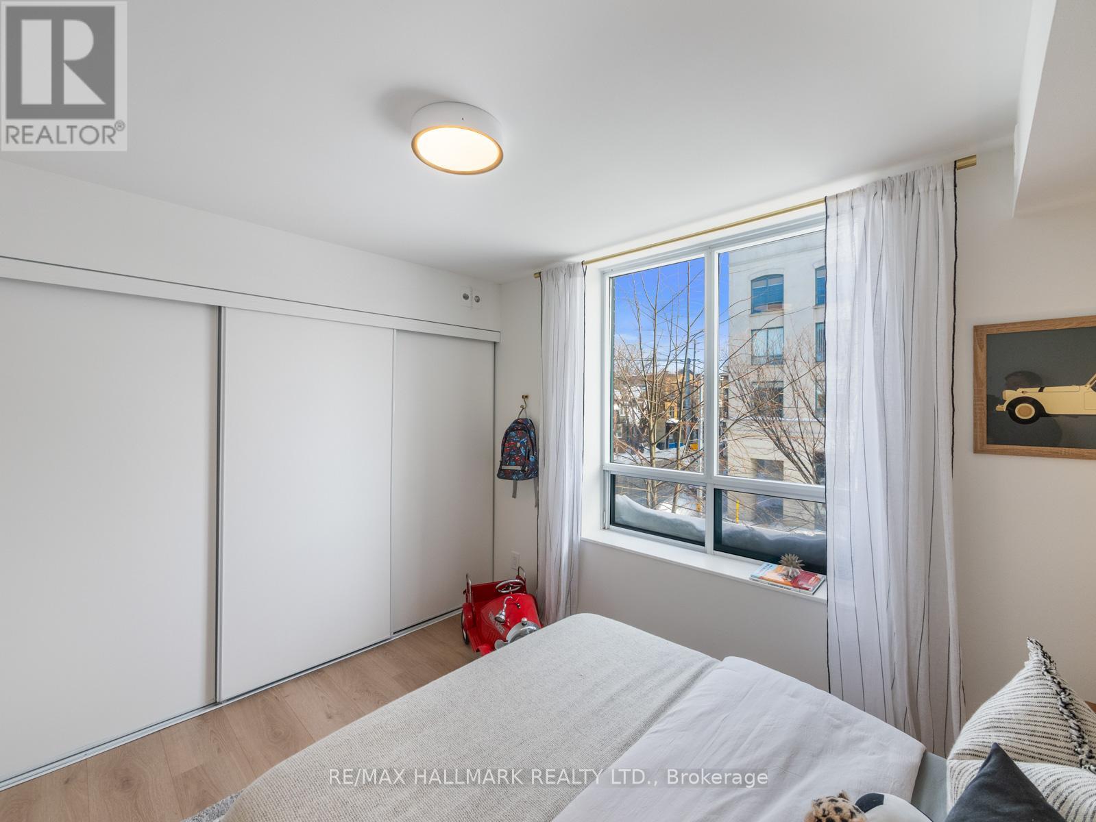 211 - 1765 QUEEN STREET E