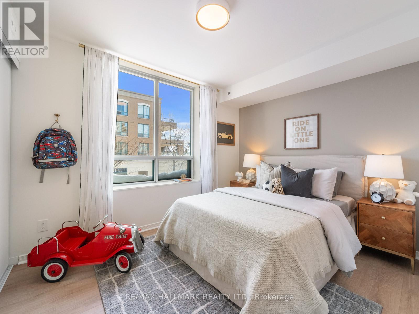 211 - 1765 QUEEN STREET E