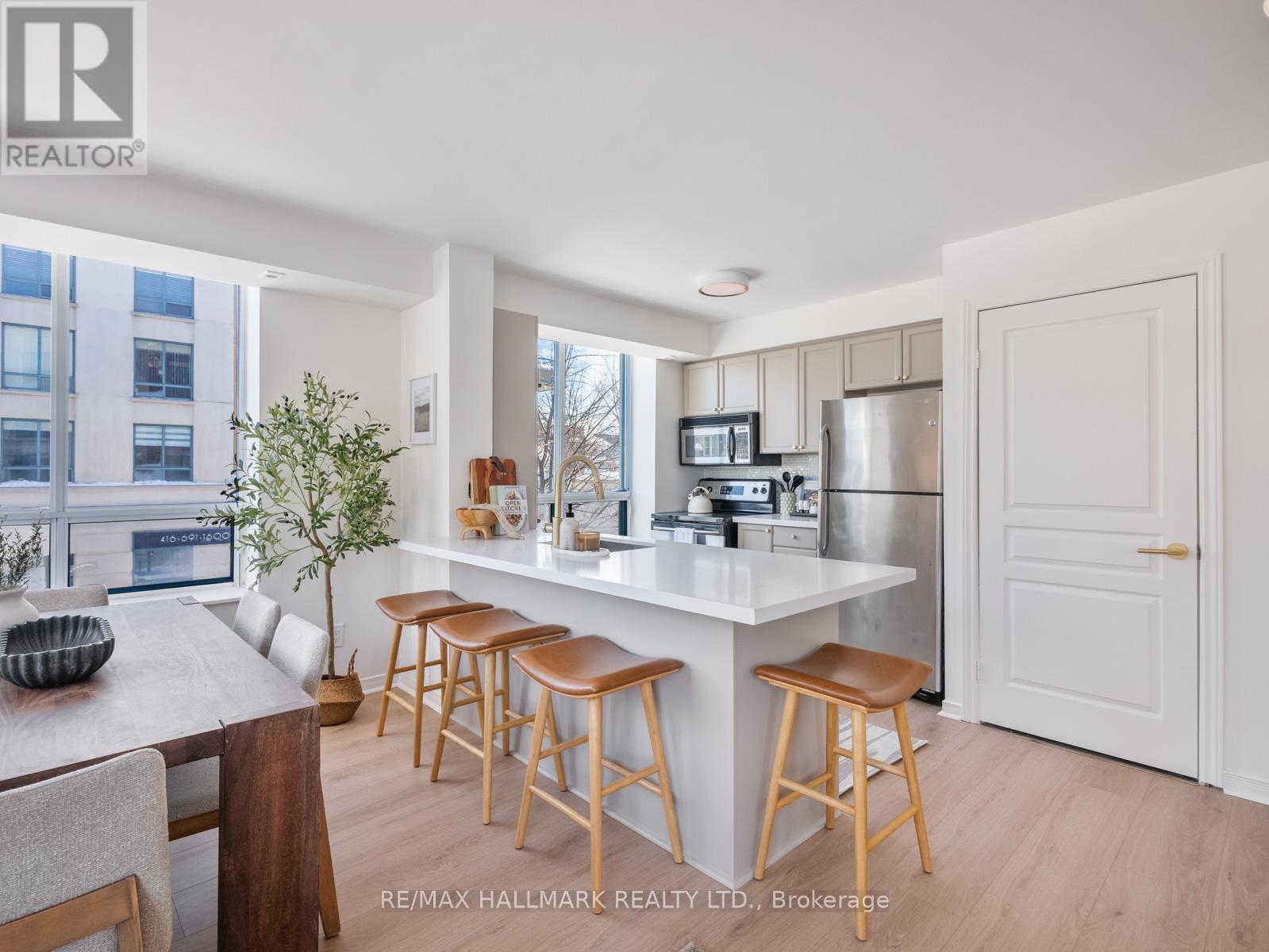 211 - 1765 QUEEN STREET E