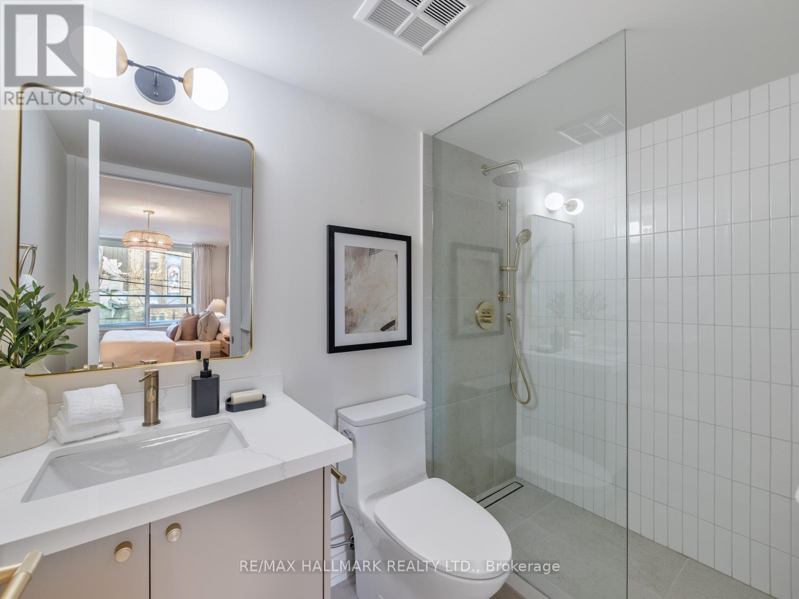 211 - 1765 QUEEN STREET E