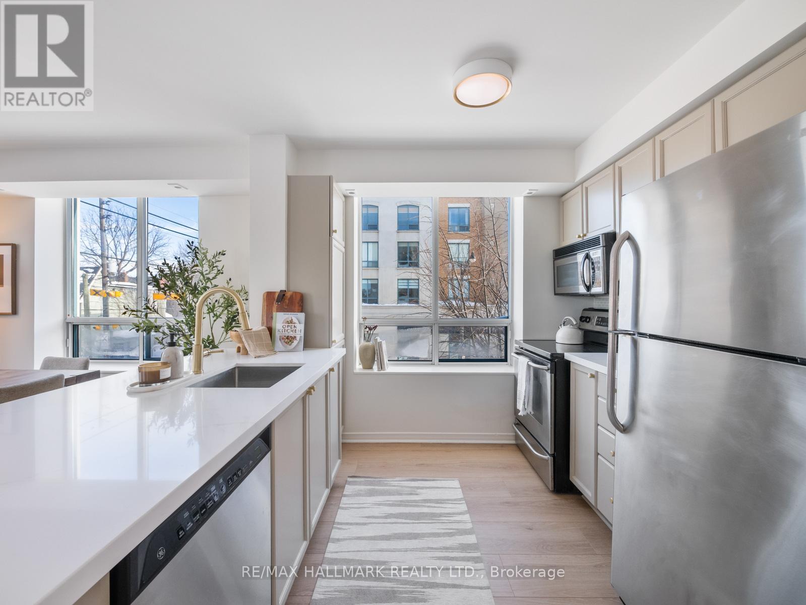 211 - 1765 QUEEN STREET E