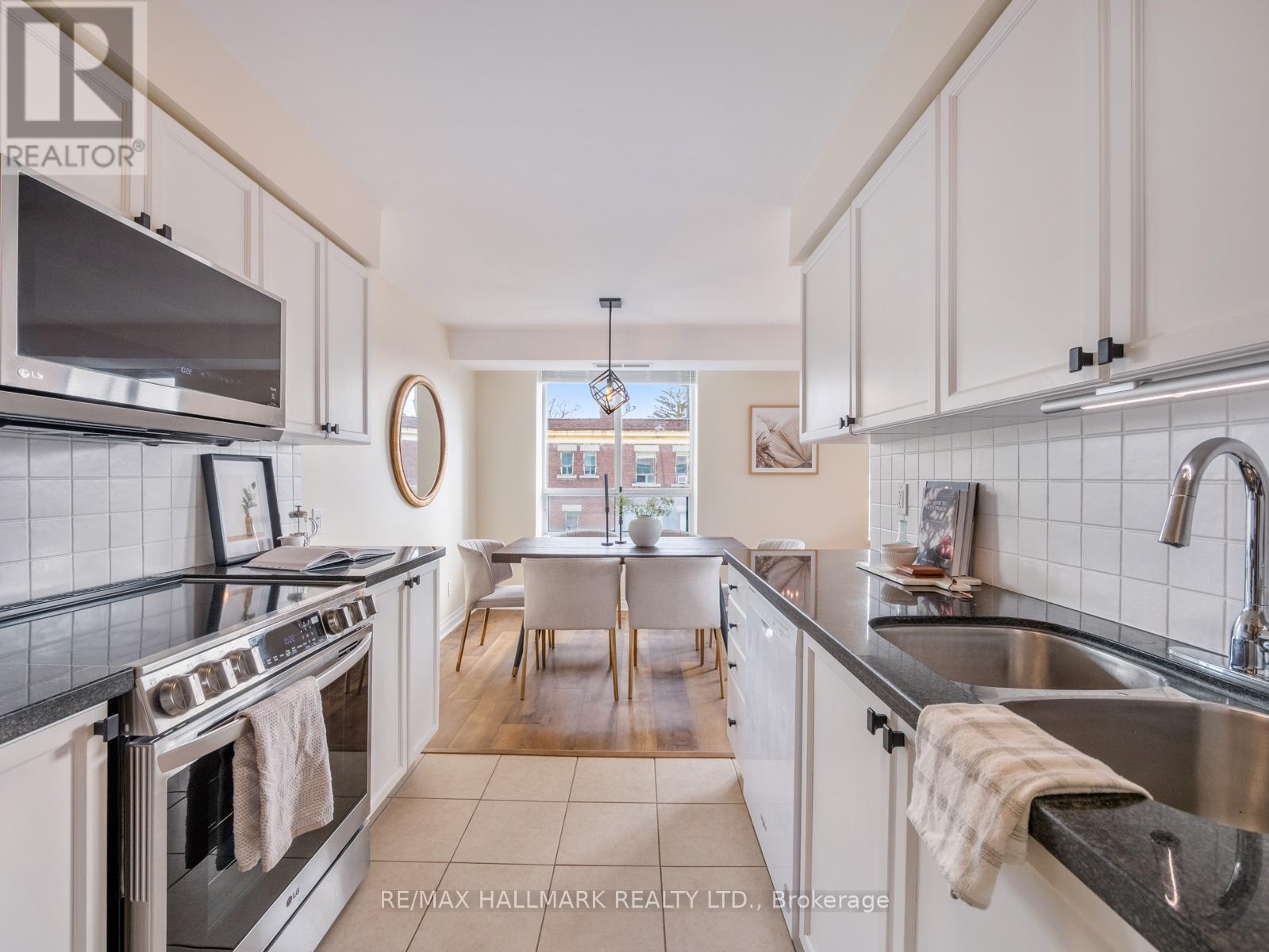 317 - 1863 QUEEN STREET E