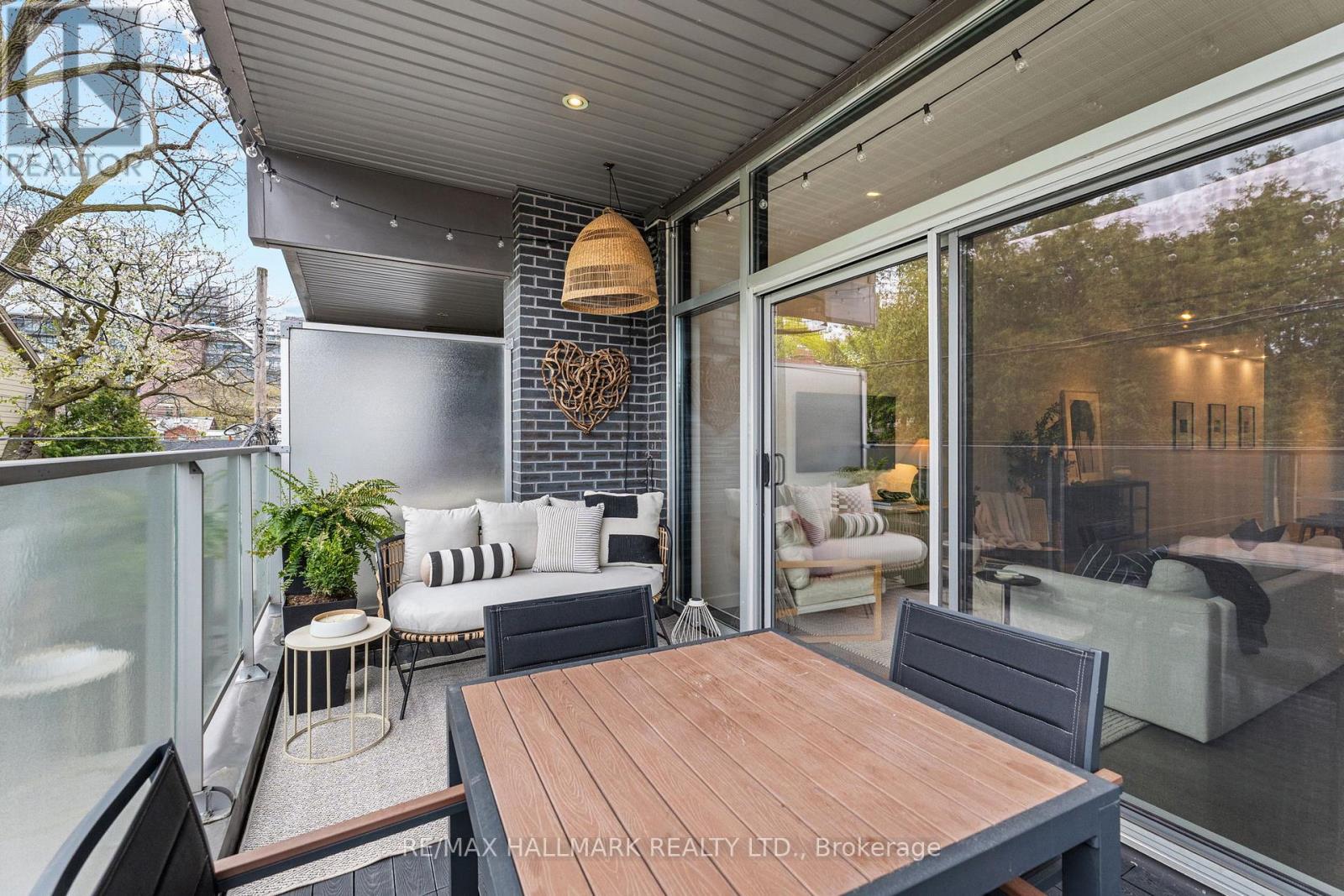 202 - 747 QUEEN STREET E