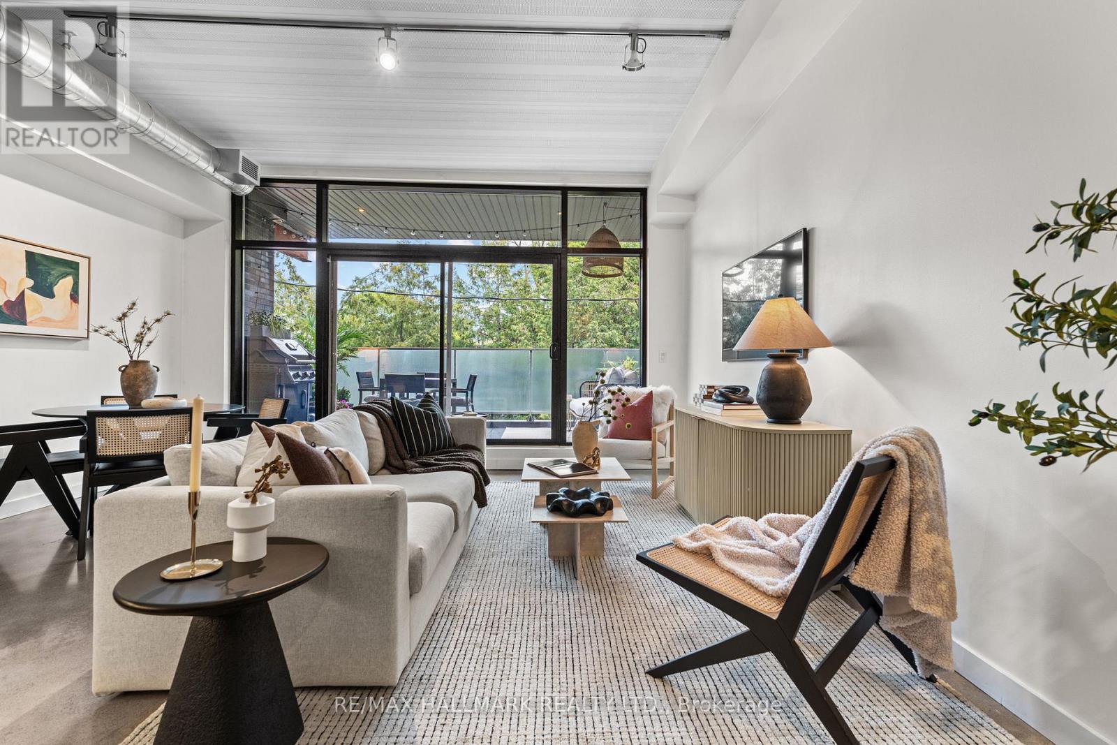 202 - 747 QUEEN STREET E